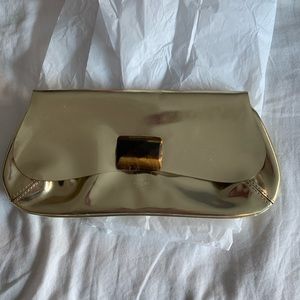 Anna Hindmarch.London gold bag